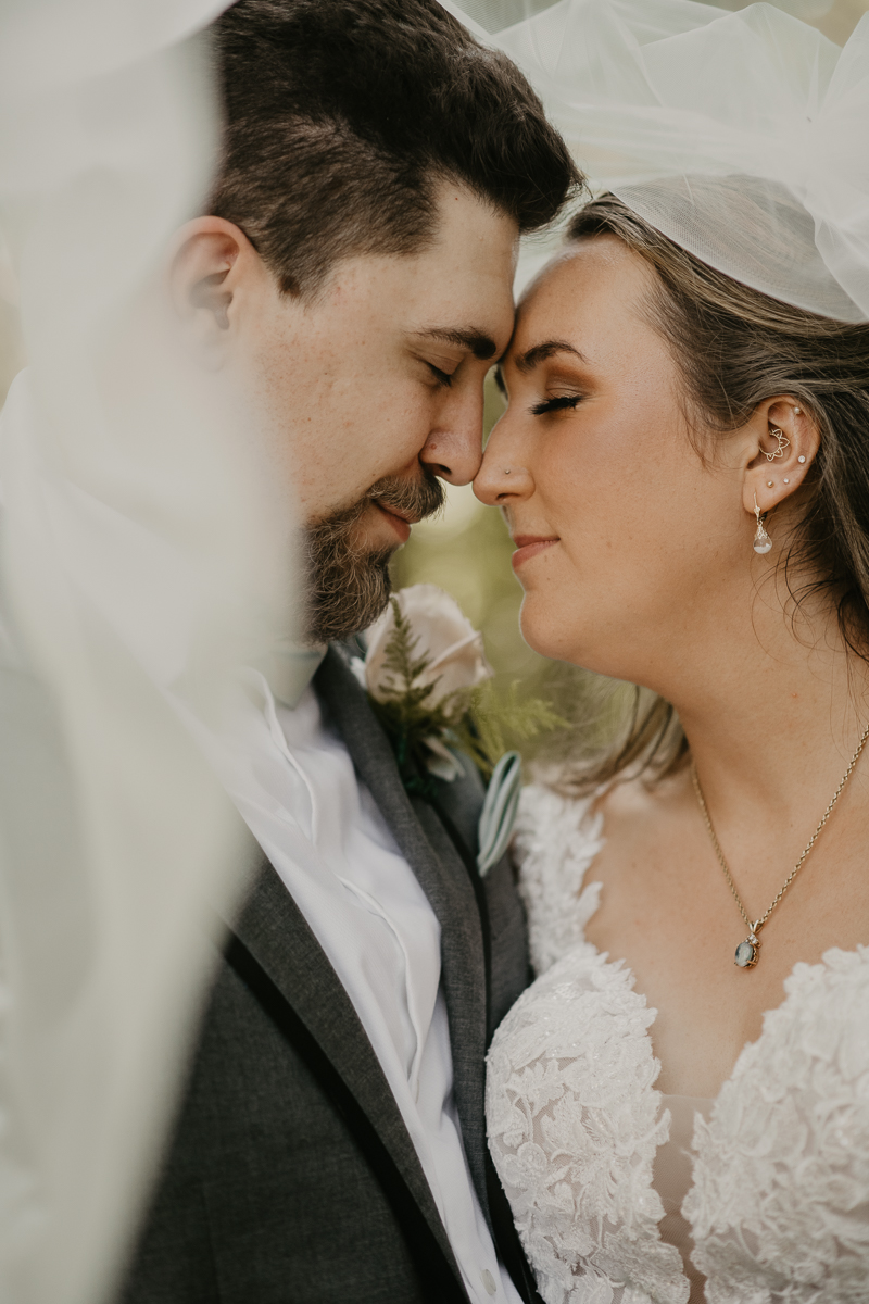 Stunning bride and groom wedding portraits at the Liriodendron Mansion in Bel Air, Maryland by Britney Clause Photography