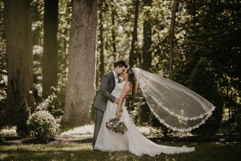 Stunning bride and groom wedding portraits at the Liriodendron Mansion in Bel Air, Maryland by Britney Clause Photography