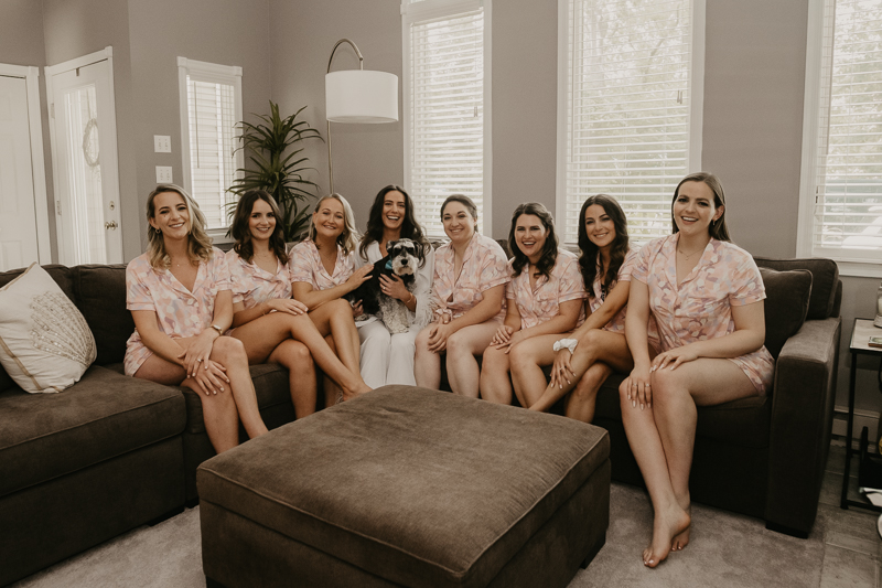 A bride getting ready at a private residence for a William Paca House Wedding in Annapolis, Maryland by Britney Clause Photography