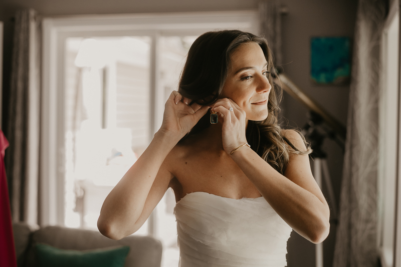 A bride getting ready at a private residence for a William Paca House Wedding in Annapolis, Maryland by Britney Clause Photography