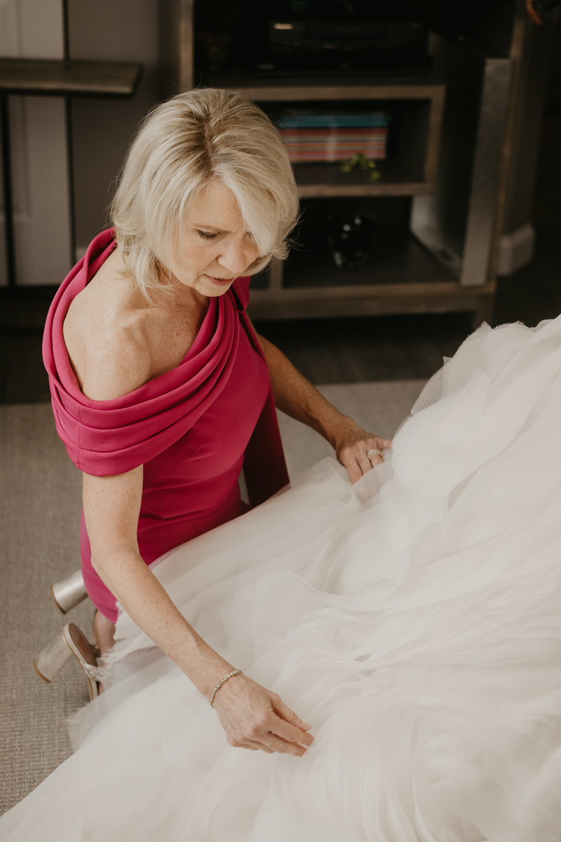 A bride getting ready at a private residence for a William Paca House Wedding in Annapolis, Maryland by Britney Clause Photography