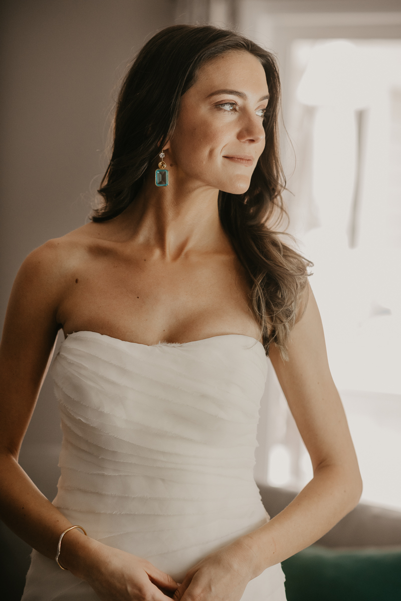 A bride getting ready at a private residence for a William Paca House Wedding in Annapolis, Maryland by Britney Clause Photography