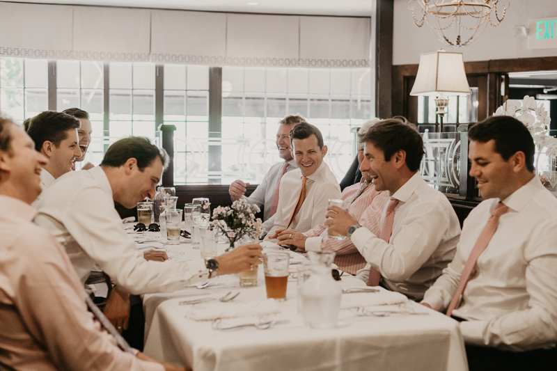 A groom getting ready at the State House for a William Paca House Wedding in Annapolis, Maryland by Britney Clause Photography