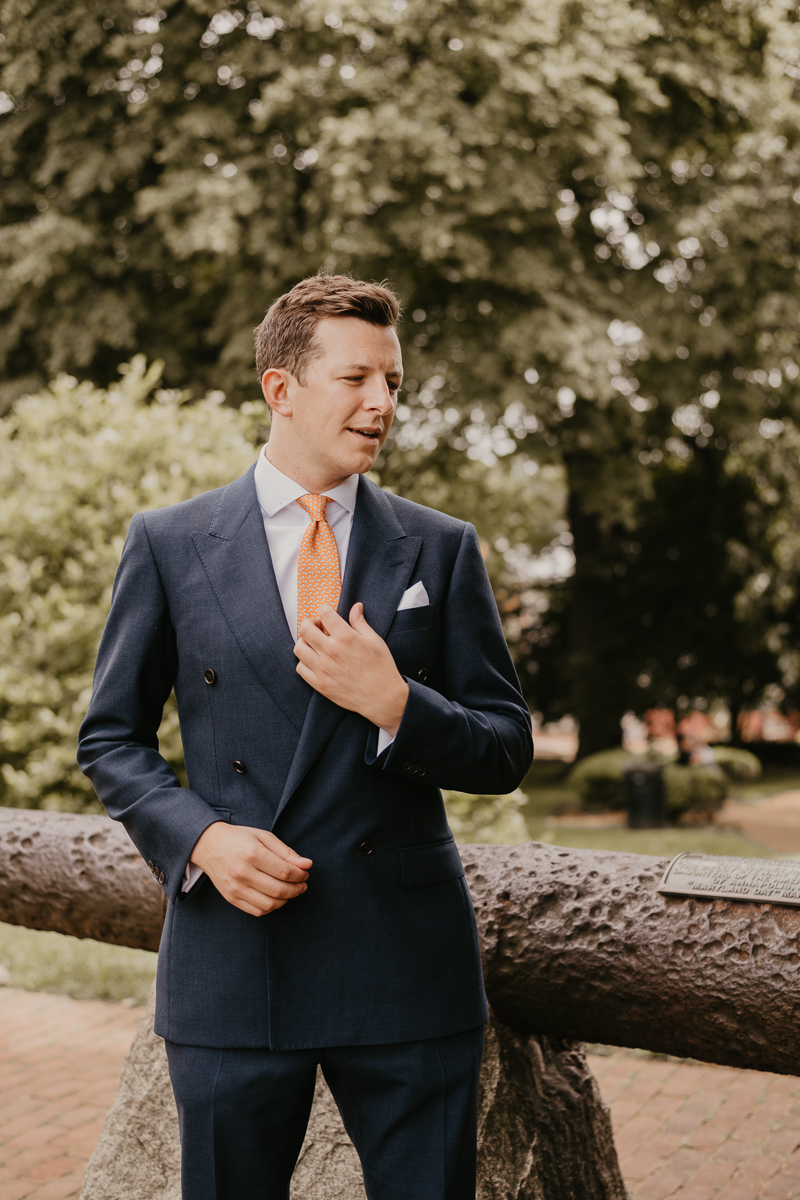 A groom getting ready at the State House for a William Paca House Wedding in Annapolis, Maryland by Britney Clause Photography