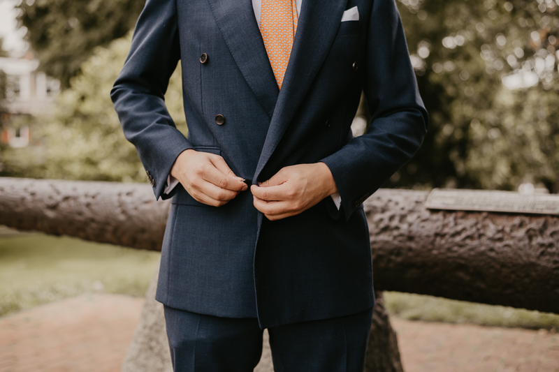 A groom getting ready at the State House for a William Paca House Wedding in Annapolis, Maryland by Britney Clause Photography