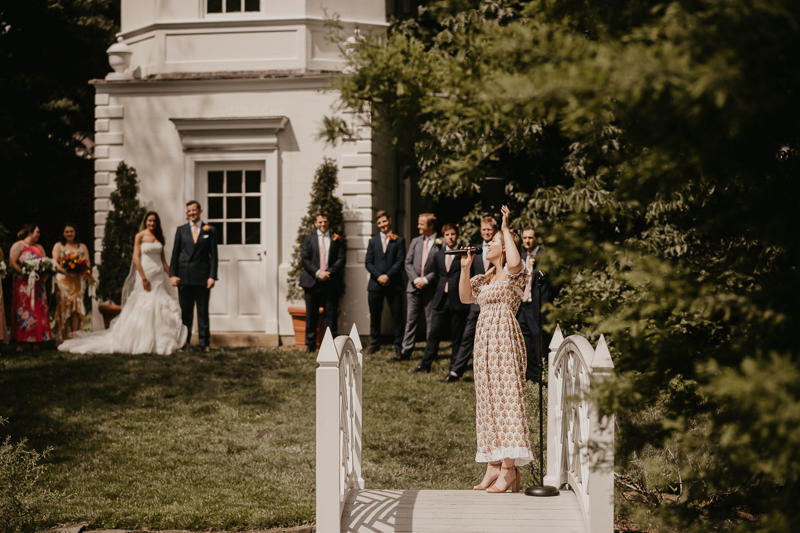 Amazing garden wedding ceremony at the William Paca House Wedding in Annapolis, Maryland by Britney Clause Photography