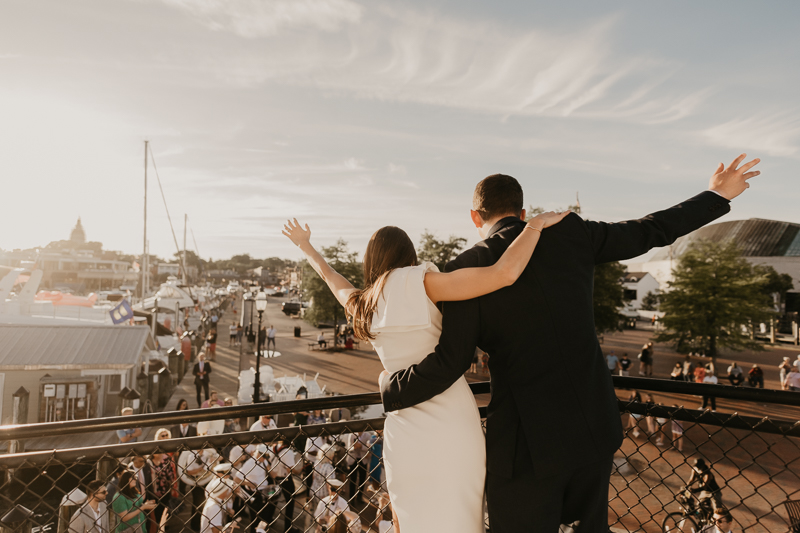 A high energy wedding march through the streets of Annapolis, Maryland by Naptown Brass Band from the William Paca House to Ego Alley by Britney Clause Photography