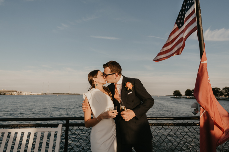 An exciting evening wedding reception by Watershed Entertainment and Timmie Metz Band on the Harbor Queen boat in Annapolis, Maryland by Britney Clause Photography