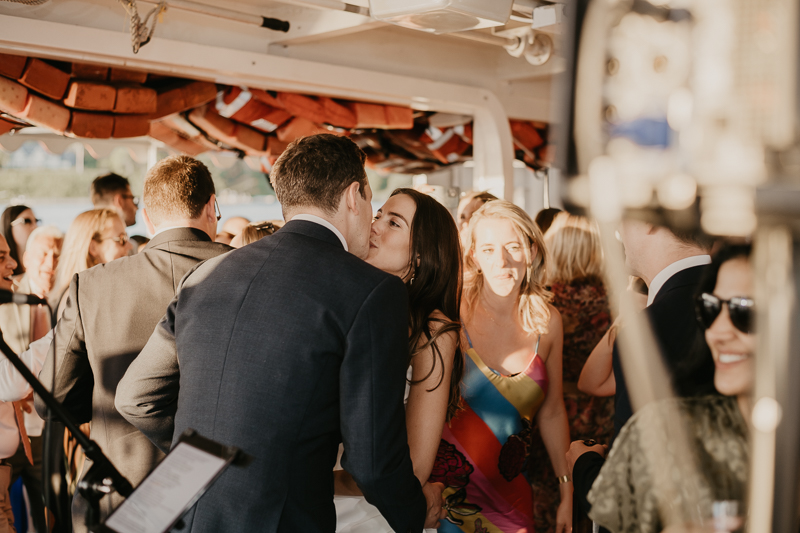 An exciting evening wedding reception by Watershed Entertainment and Timmie Metz Band on the Harbor Queen boat in Annapolis, Maryland by Britney Clause Photography