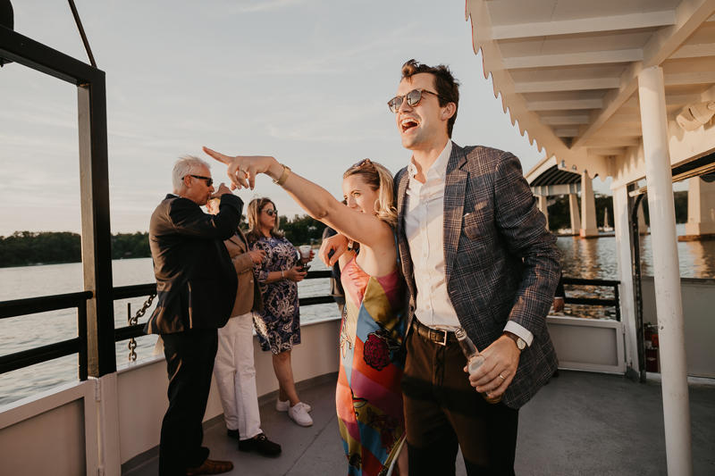 An exciting evening wedding reception by Watershed Entertainment and Timmie Metz Band on the Harbor Queen boat in Annapolis, Maryland by Britney Clause Photography