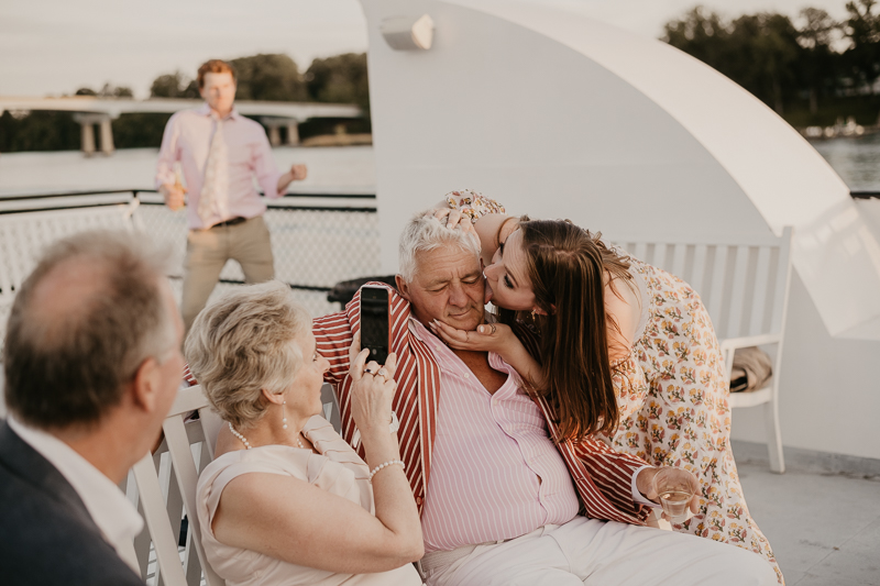 An exciting evening wedding reception by Watershed Entertainment and Timmie Metz Band on the Harbor Queen boat in Annapolis, Maryland by Britney Clause Photography