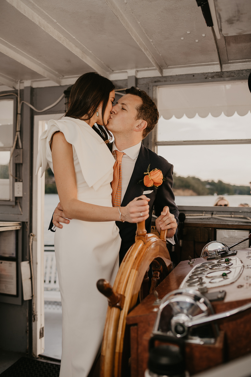 An exciting evening wedding reception by Watershed Entertainment and Timmie Metz Band on the Harbor Queen boat in Annapolis, Maryland by Britney Clause Photography