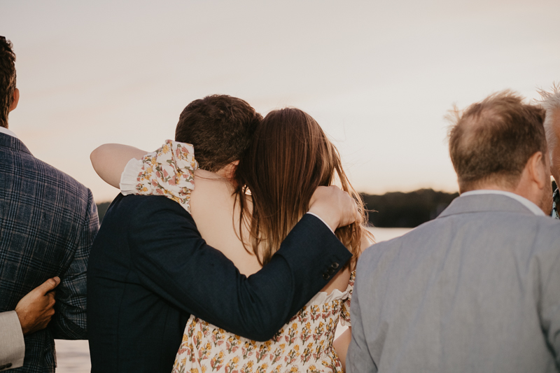 An exciting evening wedding reception by Watershed Entertainment and Timmie Metz Band on the Harbor Queen boat in Annapolis, Maryland by Britney Clause Photography