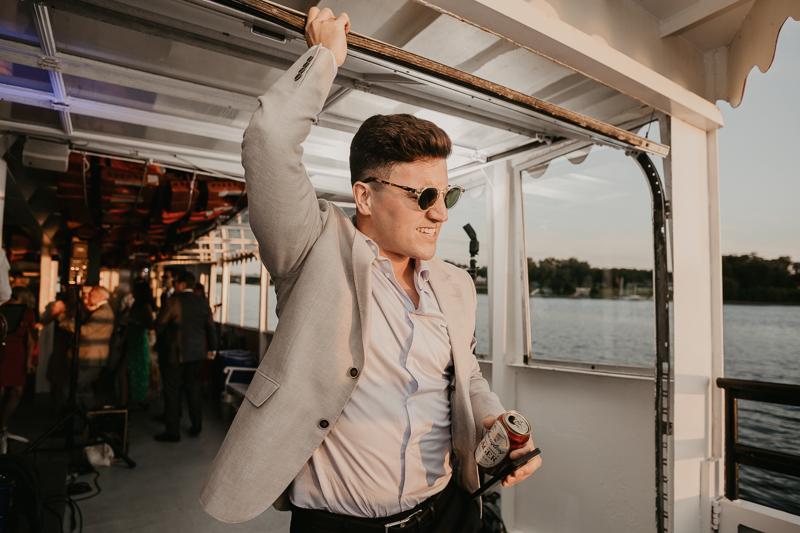 An exciting evening wedding reception by Watershed Entertainment and Timmie Metz Band on the Harbor Queen boat in Annapolis, Maryland by Britney Clause Photography