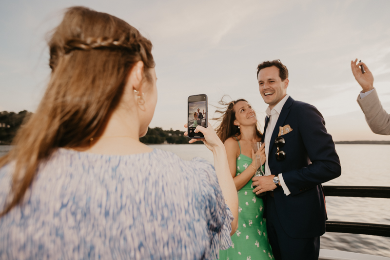 An exciting evening wedding reception by Watershed Entertainment and Timmie Metz Band on the Harbor Queen boat in Annapolis, Maryland by Britney Clause Photography