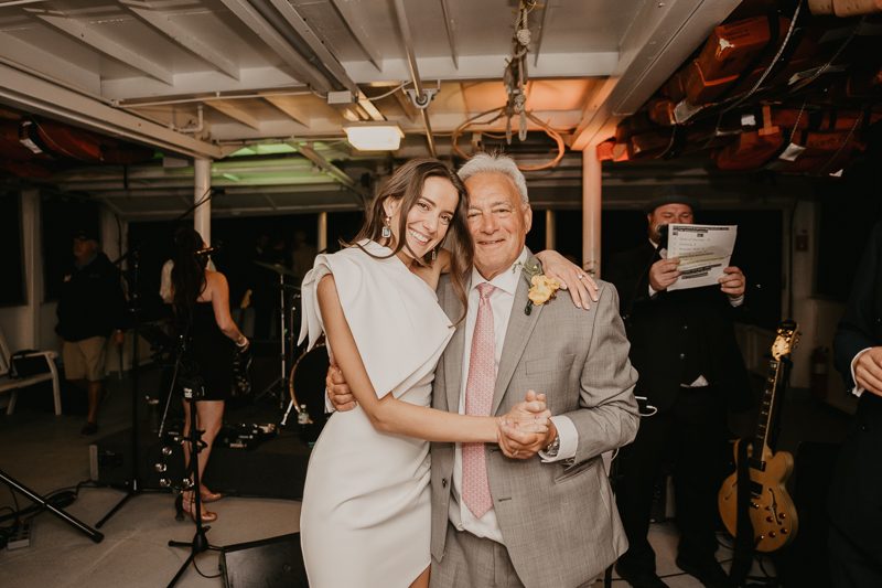 An exciting evening wedding reception by Watershed Entertainment and Timmie Metz Band on the Harbor Queen boat in Annapolis, Maryland by Britney Clause Photography