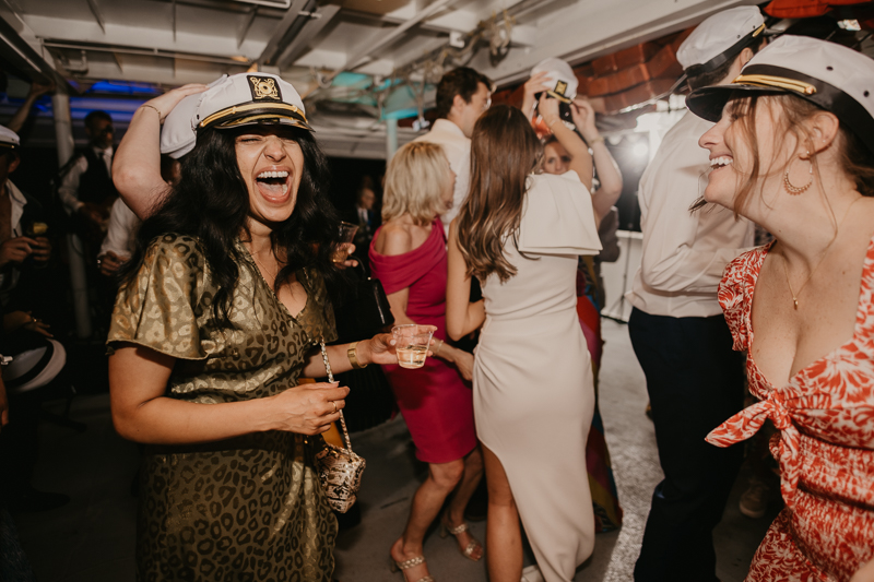 An exciting evening wedding reception by Watershed Entertainment and Timmie Metz Band on the Harbor Queen boat in Annapolis, Maryland by Britney Clause Photography