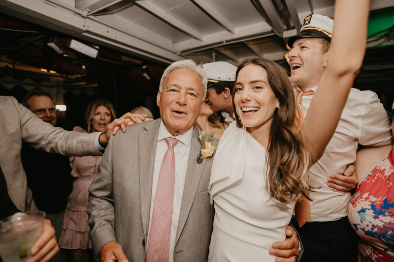 An exciting evening wedding reception by Watershed Entertainment and Timmie Metz Band on the Harbor Queen boat in Annapolis, Maryland by Britney Clause Photography