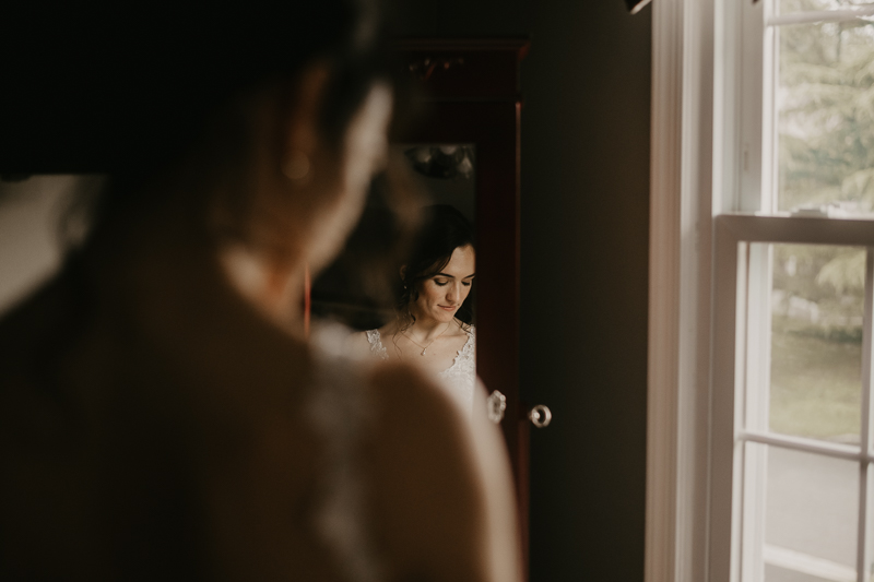 A bride getting ready at a private residence for an Ellicott City, Maryland wedding by Britney Clause Photography