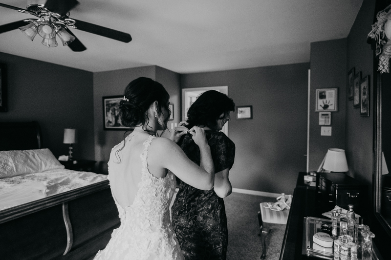 A bride getting ready at a private residence for an Ellicott City, Maryland wedding by Britney Clause Photography