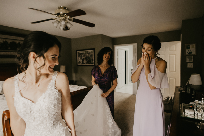 A bride getting ready at a private residence for an Ellicott City, Maryland wedding by Britney Clause Photography