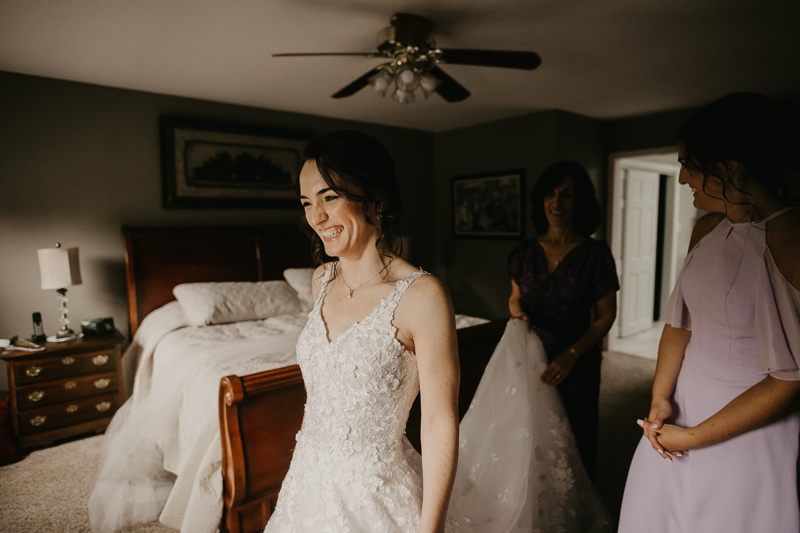 A bride getting ready at a private residence for an Ellicott City, Maryland wedding by Britney Clause Photography