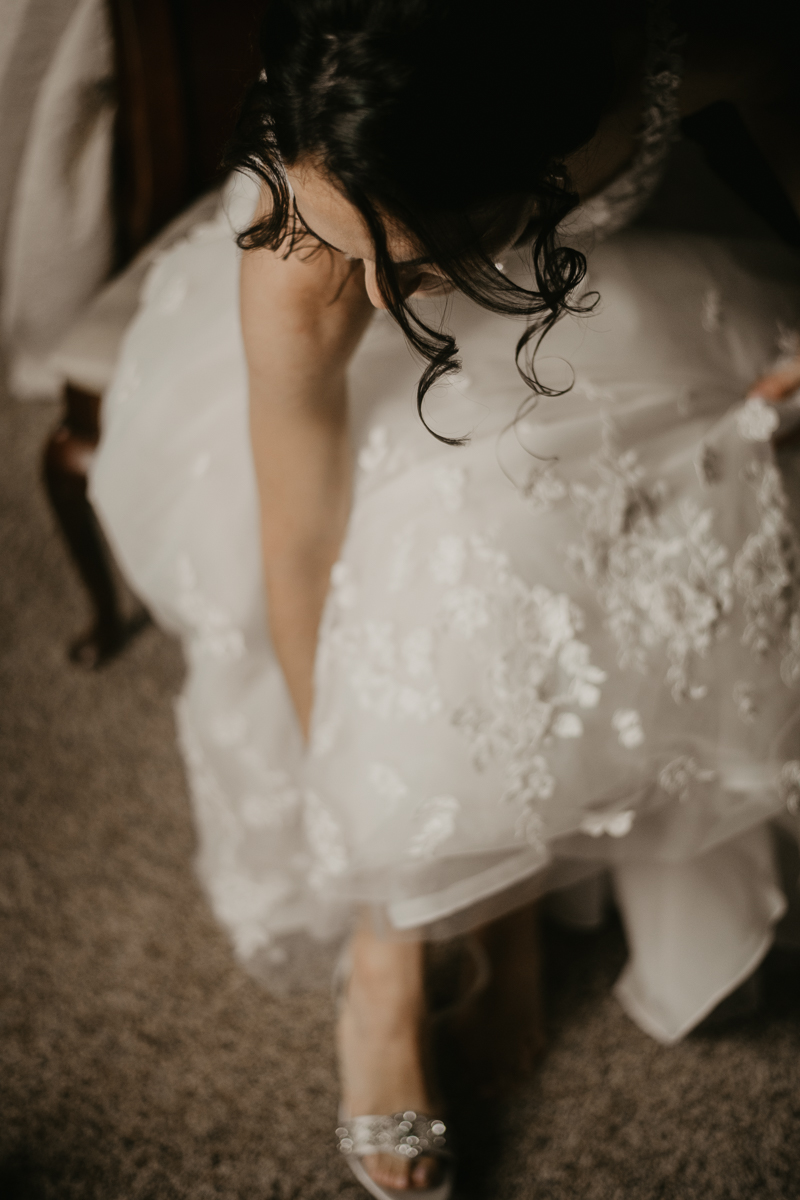 A bride getting ready at a private residence for an Ellicott City, Maryland wedding by Britney Clause Photography