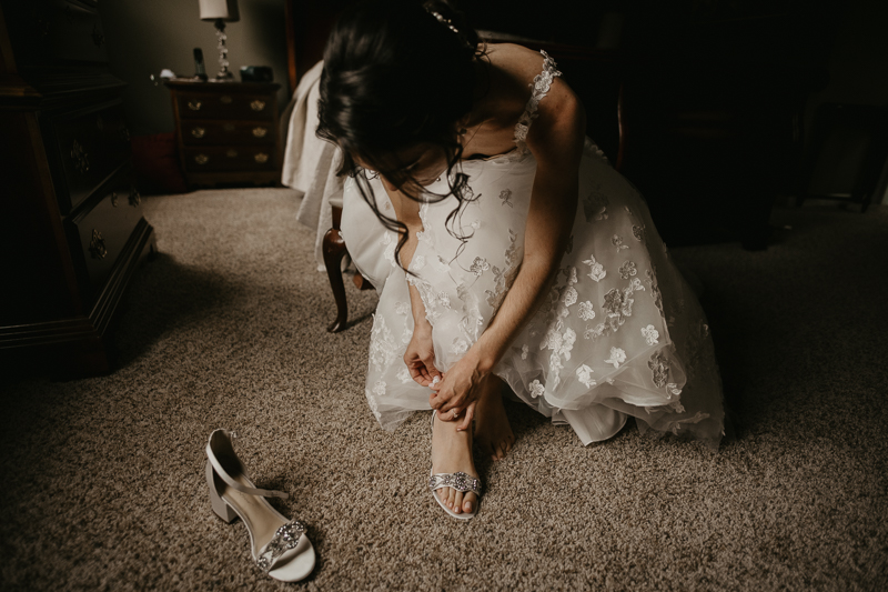 A bride getting ready at a private residence for an Ellicott City, Maryland wedding by Britney Clause Photography