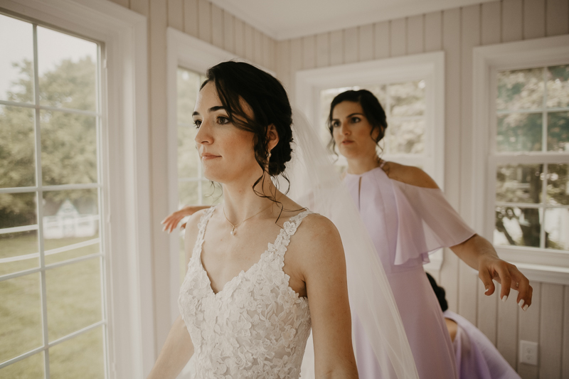 A bride getting ready at a private residence for an Ellicott City, Maryland wedding by Britney Clause Photography