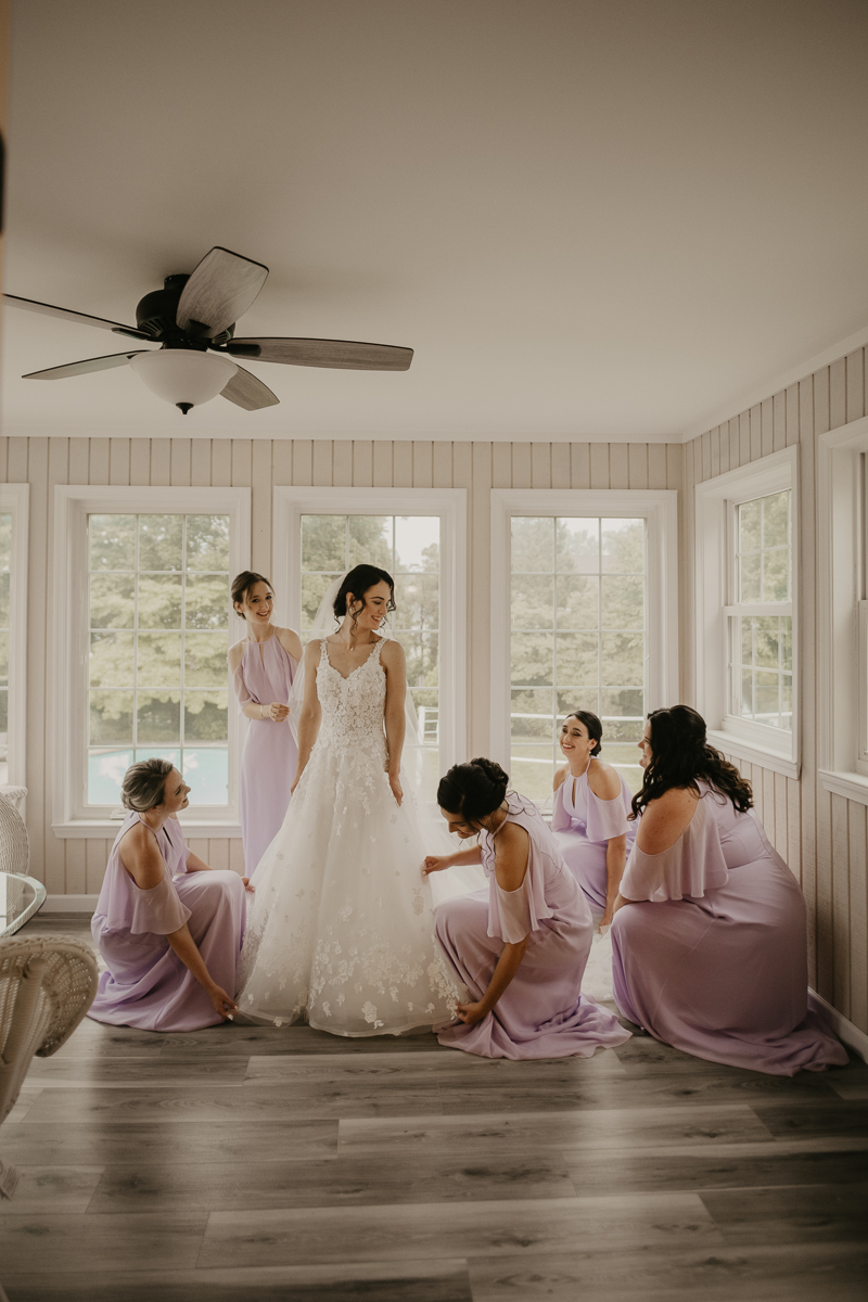 A bride getting ready at a private residence for an Ellicott City, Maryland wedding by Britney Clause Photography