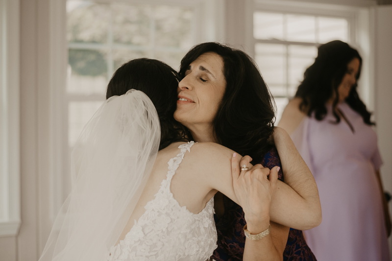 A bride getting ready at a private residence for an Ellicott City, Maryland wedding by Britney Clause Photography