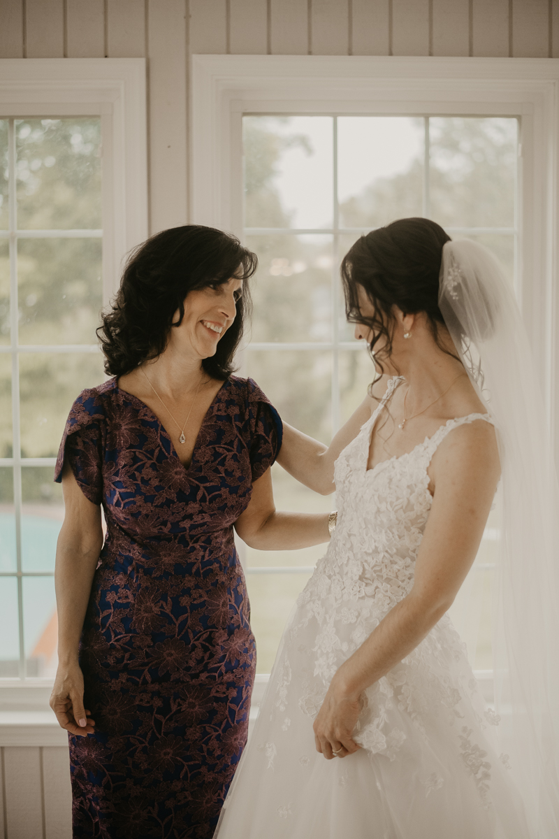 A bride getting ready at a private residence for an Ellicott City, Maryland wedding by Britney Clause Photography