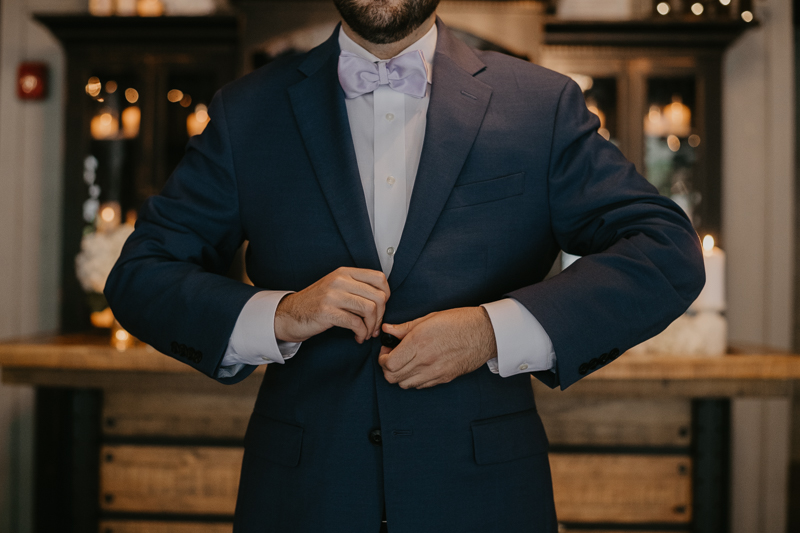 A groom getting ready at Main Street Ballroom in Ellicott City, Maryland by Britney Clause Photography