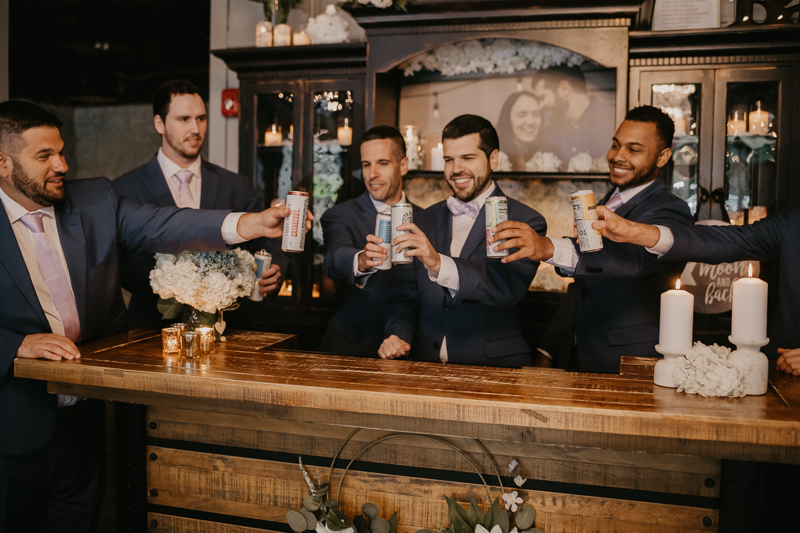 A groom getting ready at Main Street Ballroom in Ellicott City, Maryland by Britney Clause Photography