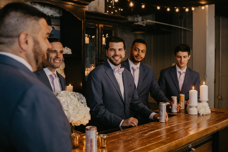 A groom getting ready at Main Street Ballroom in Ellicott City, Maryland by Britney Clause Photography