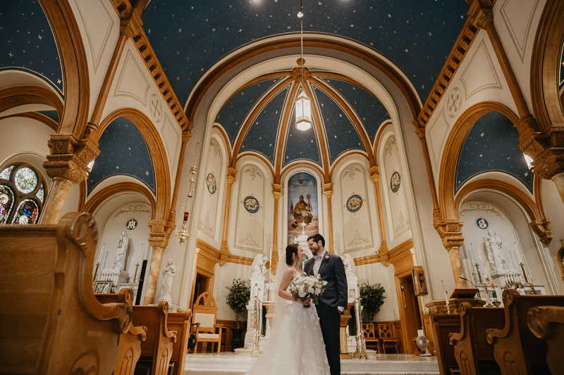 Beautiful bride and groom portraits at St. Augustine Church in Elkridge, Maryland by Britney Clause Photography
