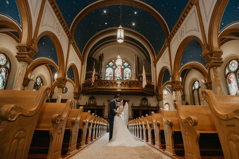 Beautiful bride and groom portraits at St. Augustine Church in Elkridge, Maryland by Britney Clause Photography