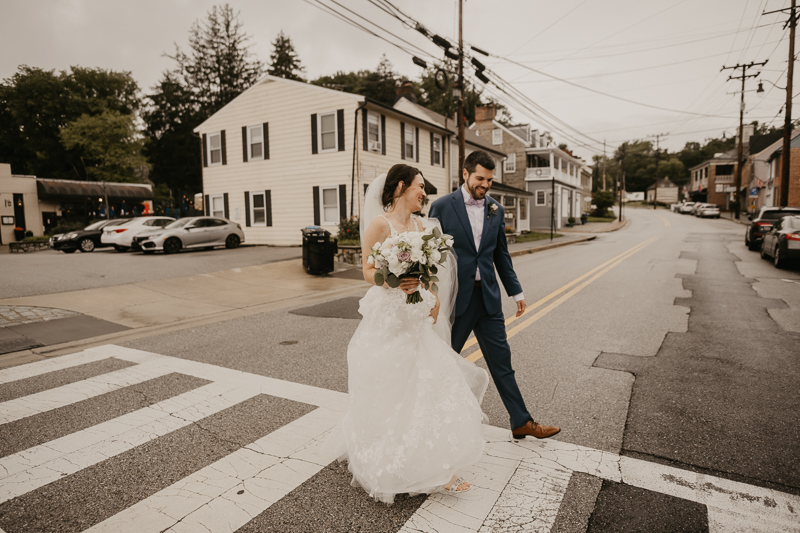 Stunning bride and groom wedding portraits at Main Street Ballroom in Ellicott City, Maryland by Britney Clause Photography