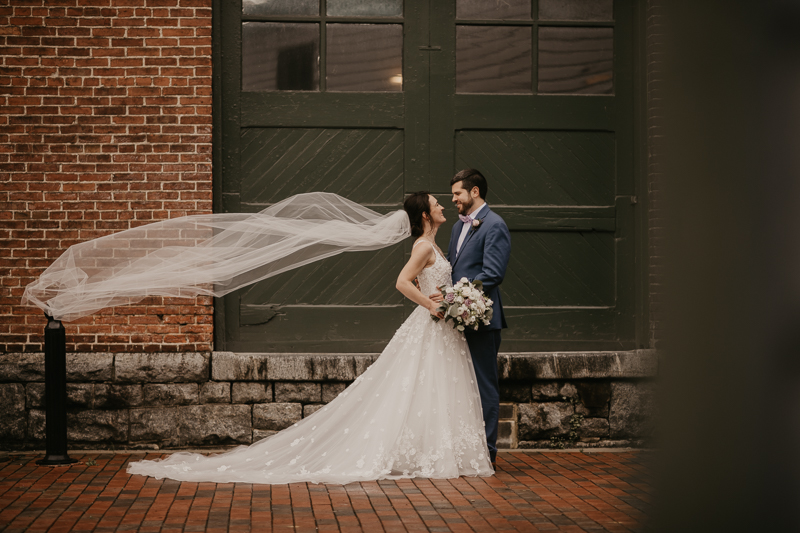 Stunning bride and groom wedding portraits at Main Street Ballroom in Ellicott City, Maryland by Britney Clause Photography