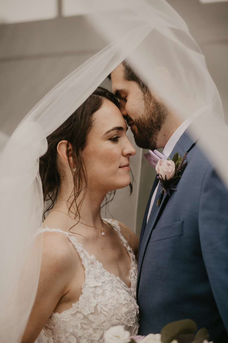 Stunning bride and groom wedding portraits at Main Street Ballroom in Ellicott City, Maryland by Britney Clause Photography