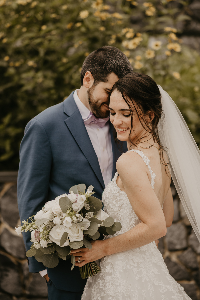 Stunning bride and groom wedding portraits at Main Street Ballroom in Ellicott City, Maryland by Britney Clause Photography