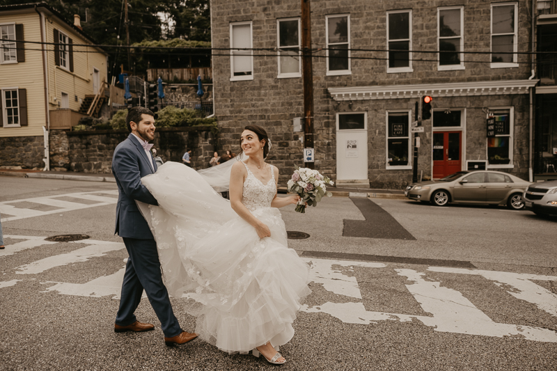 Stunning bride and groom wedding portraits at Main Street Ballroom in Ellicott City, Maryland by Britney Clause Photography