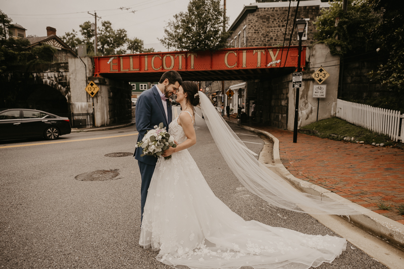 Stunning bride and groom wedding portraits at Main Street Ballroom in Ellicott City, Maryland by Britney Clause Photography