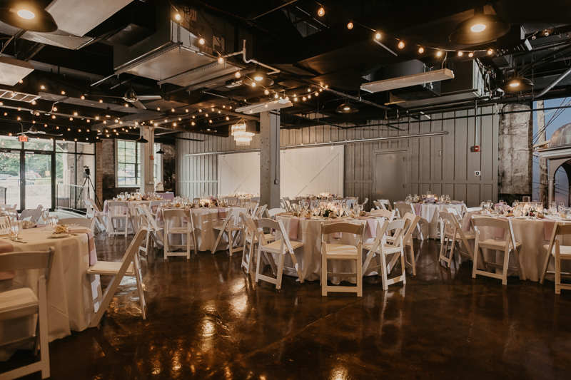 Gorgeous industrial wedding reception decor at Main Street Ballroom in Ellicott City, Maryland by Britney Clause Photography