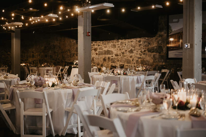 Gorgeous industrial wedding reception decor at Main Street Ballroom in Ellicott City, Maryland by Britney Clause Photography