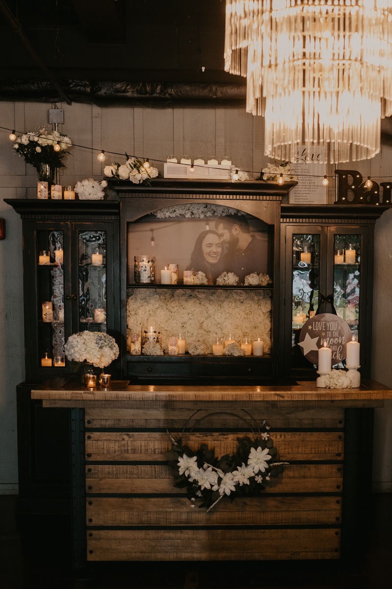 Gorgeous industrial wedding reception decor at Main Street Ballroom in Ellicott City, Maryland by Britney Clause Photography