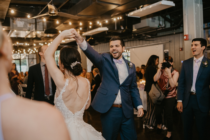 An exciting evening wedding reception by DJ Drew Albins from BMore for the Record at Main Street Ballroom in Ellicott City, Maryland by Britney Clause Photography