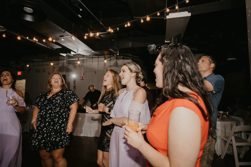 An exciting evening wedding reception by DJ Drew Albins from BMore for the Record at Main Street Ballroom in Ellicott City, Maryland by Britney Clause Photography