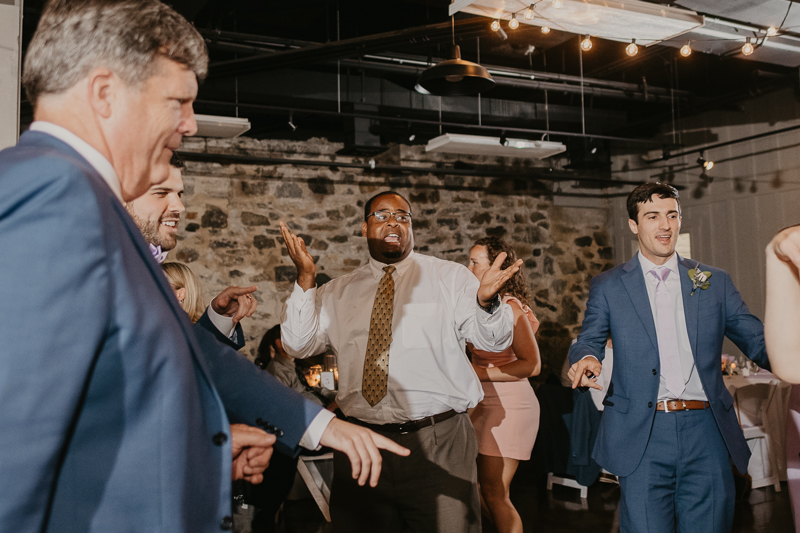 An exciting evening wedding reception by DJ Drew Albins from BMore for the Record at Main Street Ballroom in Ellicott City, Maryland by Britney Clause Photography