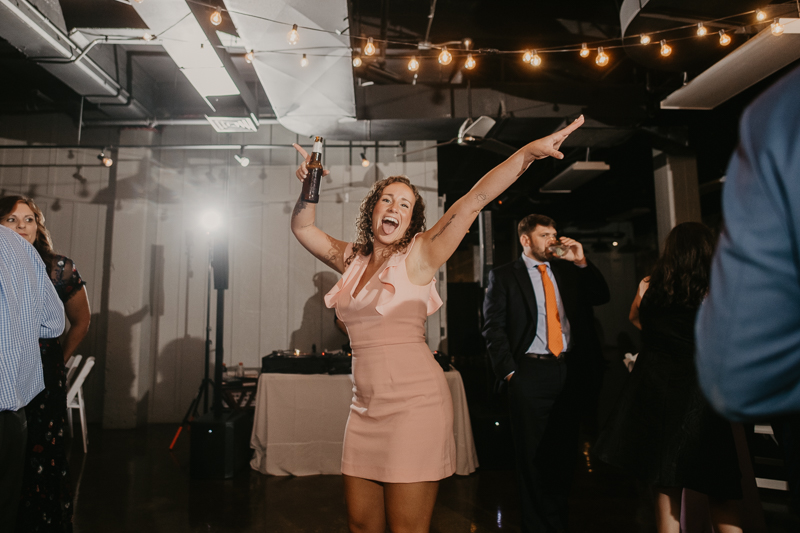 An exciting evening wedding reception by DJ Drew Albins from BMore for the Record at Main Street Ballroom in Ellicott City, Maryland by Britney Clause Photography